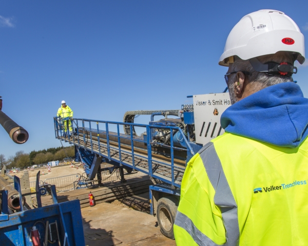 VolkerTrenchless Solutions employee on site with HDD rig.